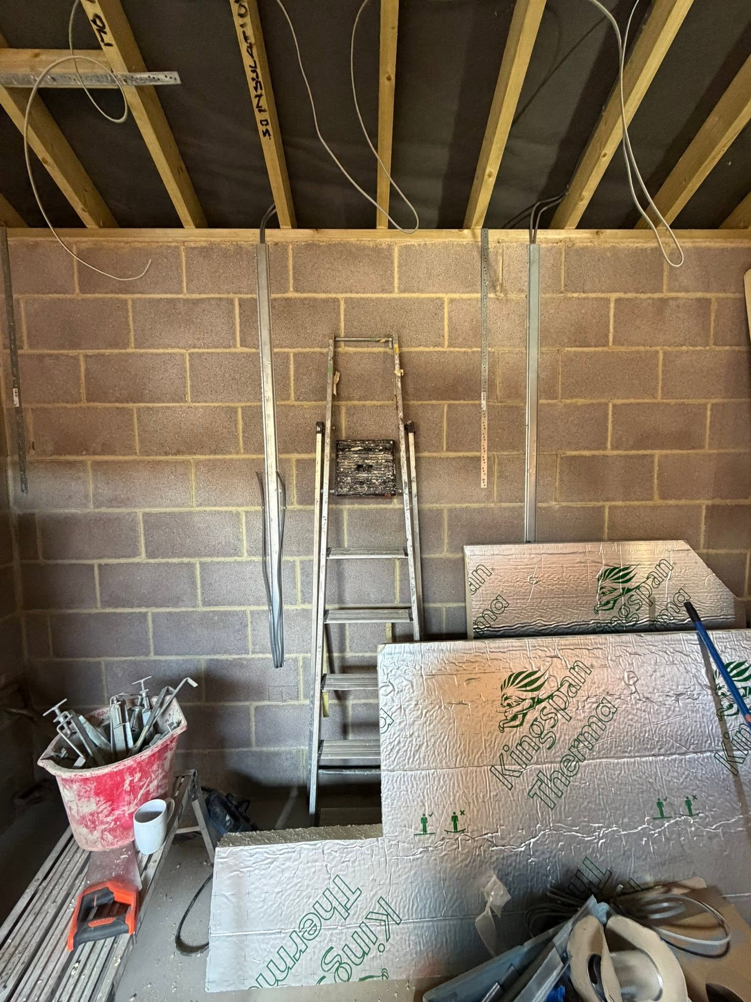 First fix cables in the roof and drops on the wall of an outbuilding